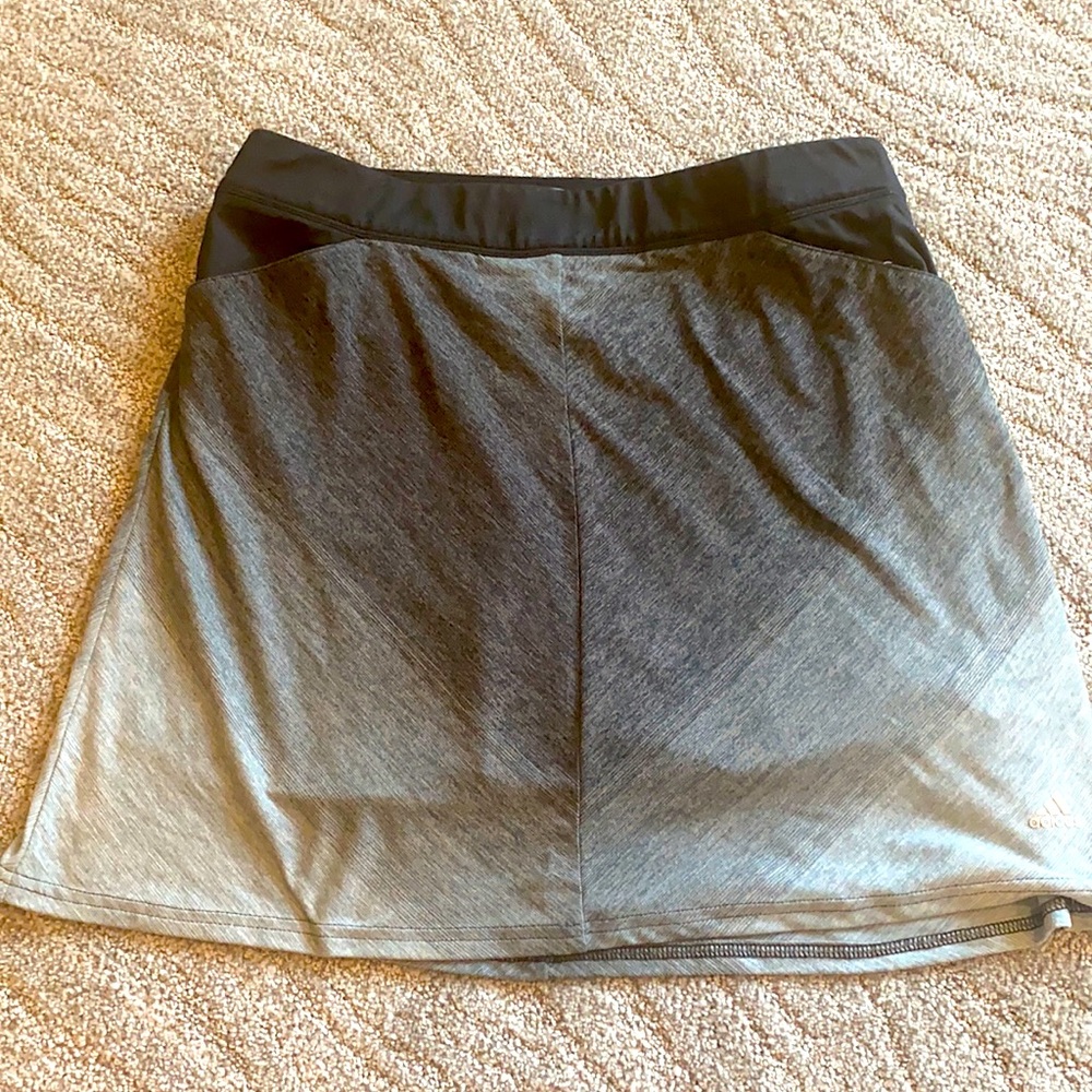 Golf skirt. Adidas. Comfort waist. Attached shorts